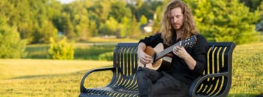 Alec Holcomb, Guitar